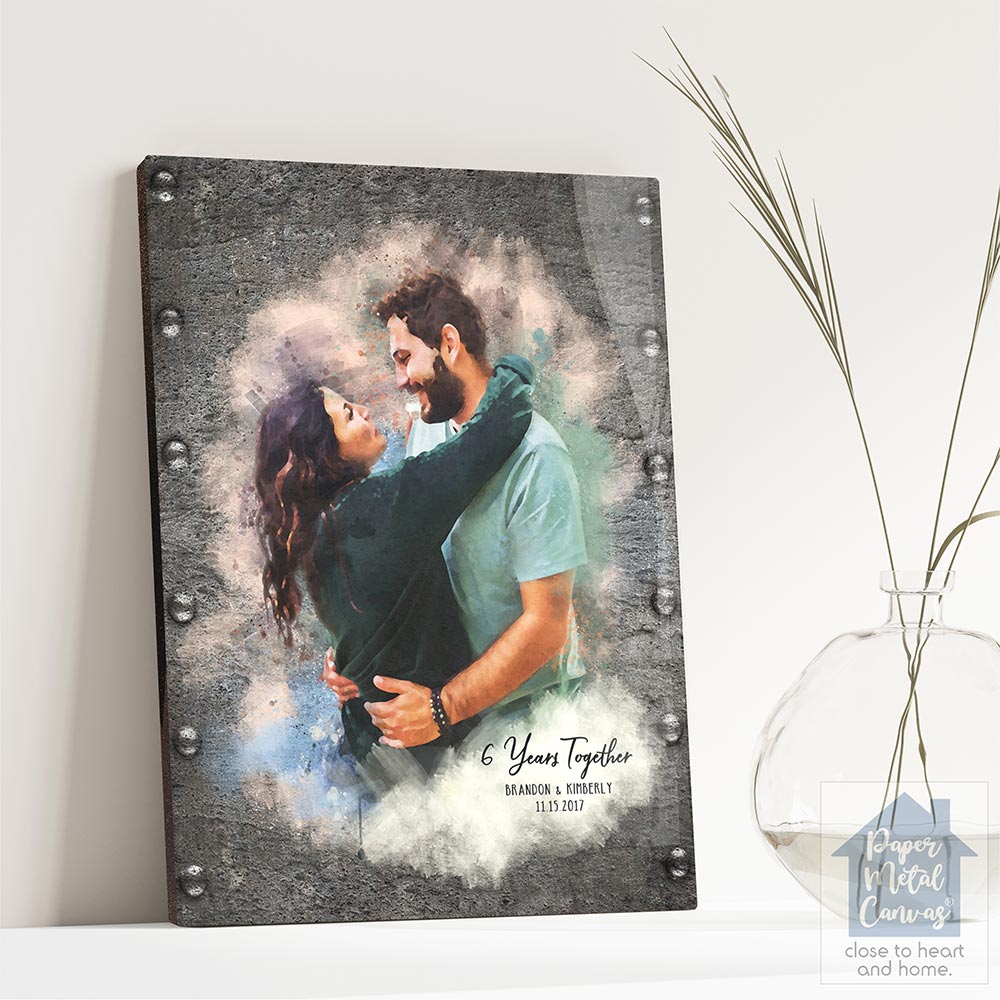 Relocation concept. A smiling cheerful multiracial couple in embraces lookin in each other eyes Relocation concept. A smiling cheerful multiracial couple in embraces lookin in each other eyes