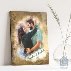 Relocation concept. A smiling cheerful multiracial couple in embraces lookin in each other eyes