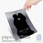 Relocation concept. A smiling cheerful multiracial couple in embraces lookin in each other eyes