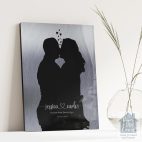 Relocation concept. A smiling cheerful multiracial couple in embraces lookin in each other eyes