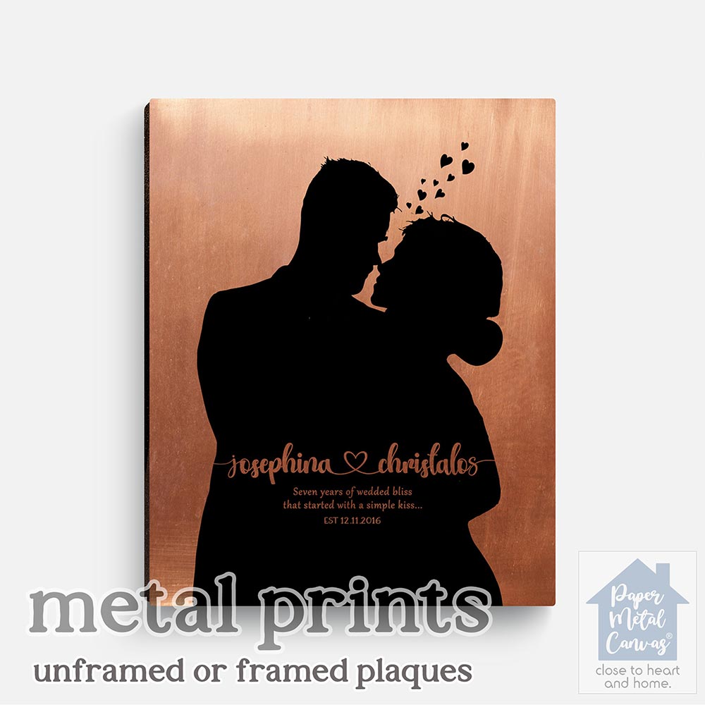 Relocation concept. A smiling cheerful multiracial couple in embraces lookin in each other eyes Relocation concept. A smiling cheerful multiracial couple in embraces lookin in each other eyes