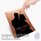 Relocation concept. A smiling cheerful multiracial couple in embraces lookin in each other eyes