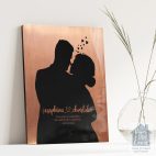 Relocation concept. A smiling cheerful multiracial couple in embraces lookin in each other eyes