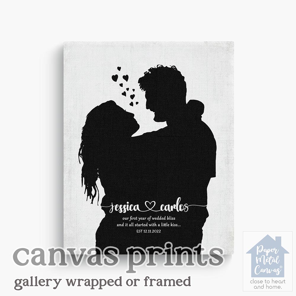 Relocation concept. A smiling cheerful multiracial couple in embraces lookin in each other eyes Relocation concept. A smiling cheerful multiracial couple in embraces lookin in each other eyes