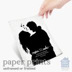 Relocation concept. A smiling cheerful multiracial couple in embraces lookin in each other eyes