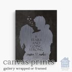 Relocation concept. A smiling cheerful multiracial couple in embraces lookin in each other eyes