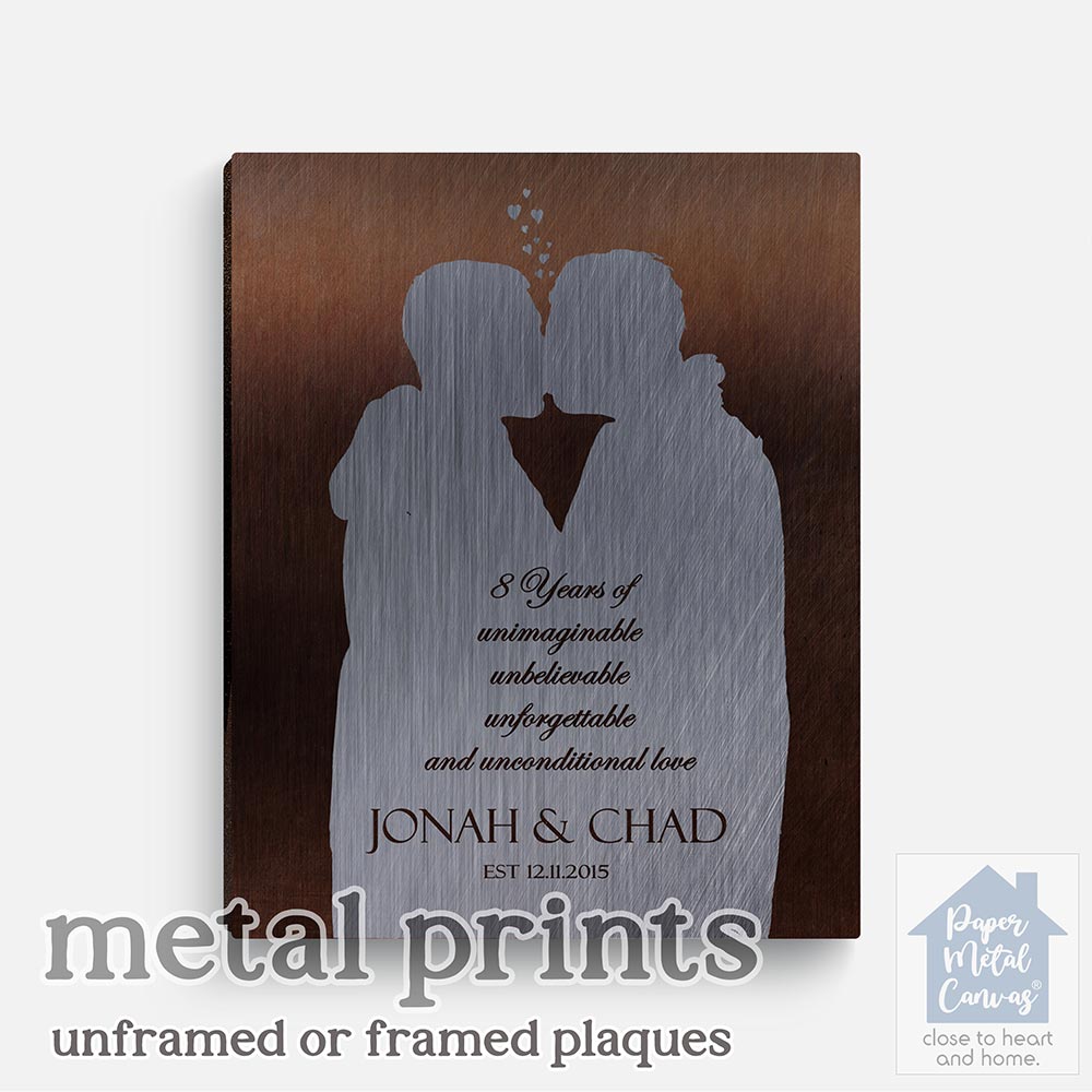 Relocation concept. A smiling cheerful multiracial couple in embraces lookin in each other eyes Relocation concept. A smiling cheerful multiracial couple in embraces lookin in each other eyes