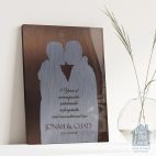 Relocation concept. A smiling cheerful multiracial couple in embraces lookin in each other eyes